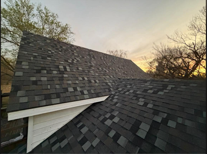 Completed shingle roof installed by Lioness Contractors